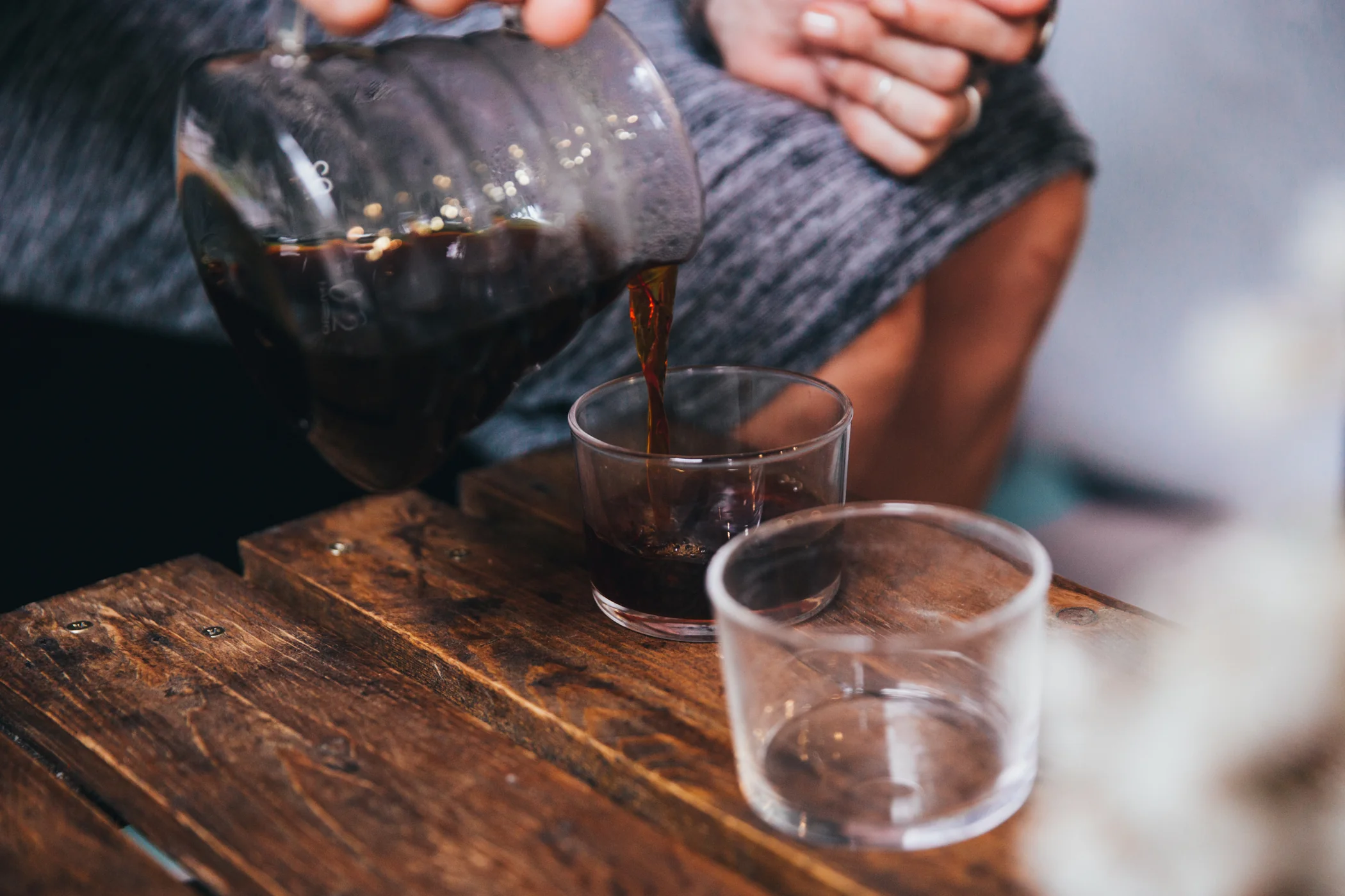Pouring a glass coffee